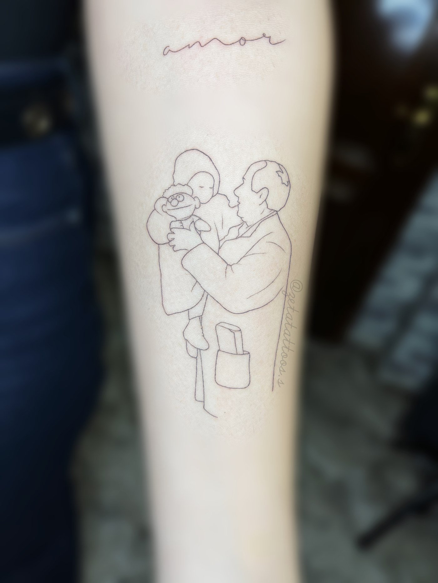 Amor, padre con muñeco